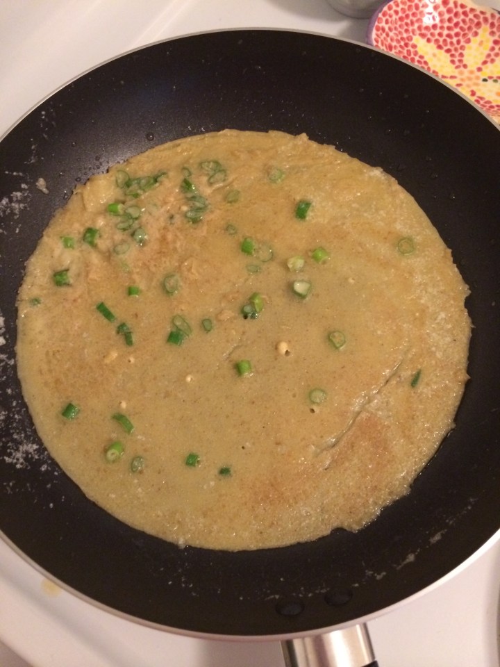 If the crepe moves as a whole piece when shaking the pan and the edges are starting to brown, that baby is ready to flip!